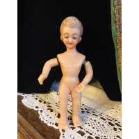 Oud wassen kindje met mooi gezichtje 