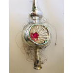 Glazen piek met deukbal gewikkeld in leonisch draad