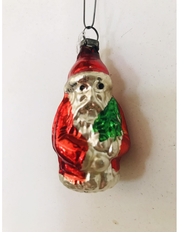 Antieke glazen kerstbal in de vorm van een kerstmannetje