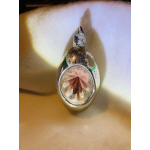 Olijf met zonnetje van het gekende Belgische merk Ajeko. 